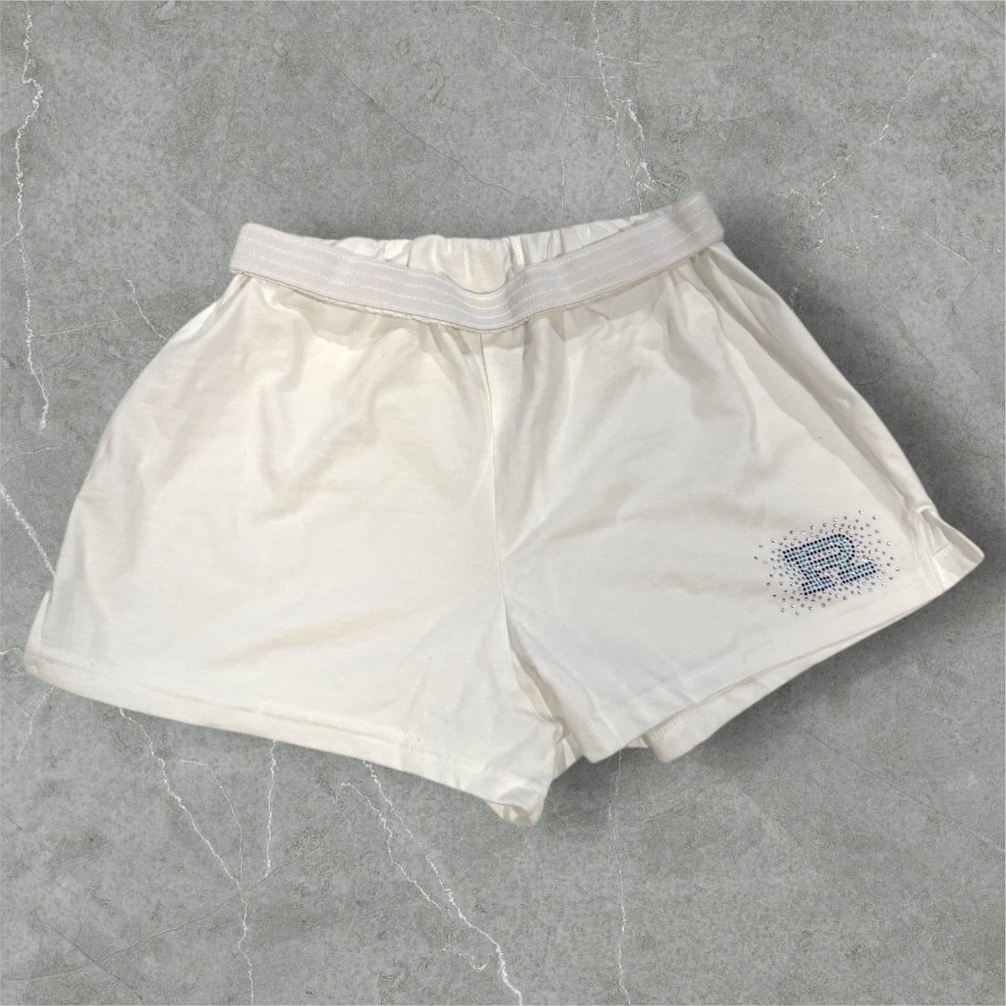 White Regina practice shorts with bling R